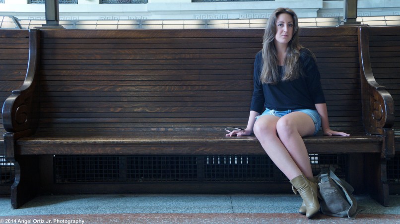 Chloe sits on a bench in the Hoboken Terminal as she looks like a wondering traveler  © 2014 Angel Ortiz Jr. Photography